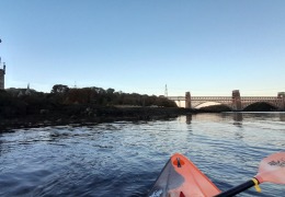 Nelson statue and Brittania Bridge from Menai Strait